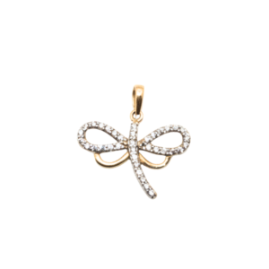 Wearing a delicate golden dragonfly pendant adorned with zirconia stones.