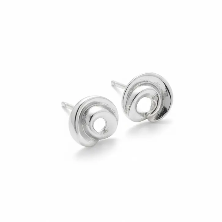 Srebrne kolczyki sztyfty spiralne muszelki 925 | BigDIAMOND Jubiler Krakow 3 Kolczyki w kształcie spirali wykonane z srebra 925.