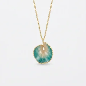 Teal and gold pendant on a chain